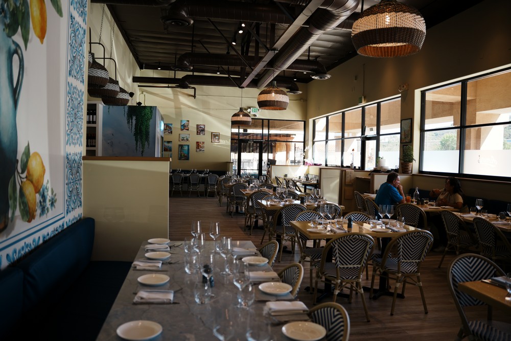 Main dining room and mural at Amuri Italian Cuisine